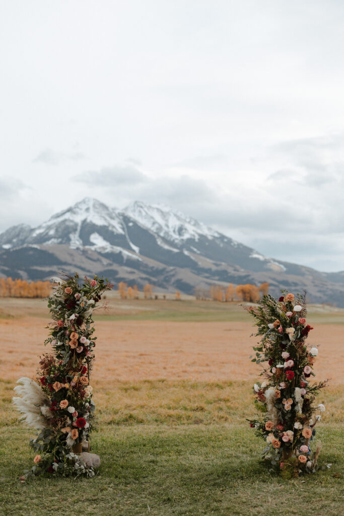 Floral backdrop for a Sage Lodge wedding in Paradise Valley Montana